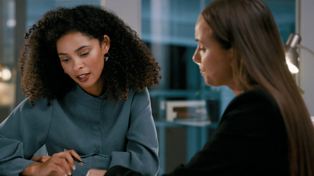 Woman receiving feedback at work