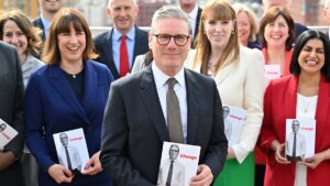 MANCHESTER, ENGLAND - JUNE 13: Labour Party leader Sir Keir Starmer poses with Rachel Reeves, Shadow Chancellor of the Exchequer (L), Angela Rayner, Deputy Leader (2nd R) and his shadow cabinet as Labour launch their general election manifesto on June 13, 2024 in Manchester, United Kingdom. Labour is consistently leading the polls by over 20 points, according to the latest YouGov data. (Photo by Anthony Devlin/Getty Images)