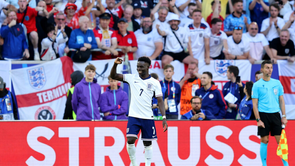 Bukayo Saka celebrates after scoring a penalty during the UEFA EURO 2024 quarter-final match between England and Switzerland