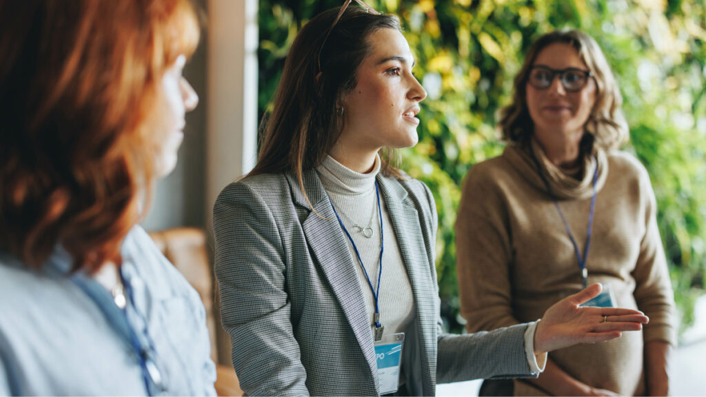 Business professionals engaged in productive conversation