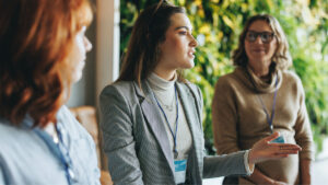 Business professionals engaged in productive conversation