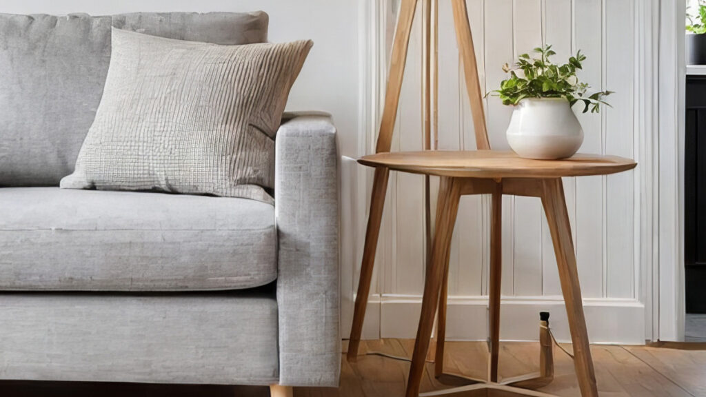 Close up of modern lamp illuminating a stylish sofa in a contemporary interior setting