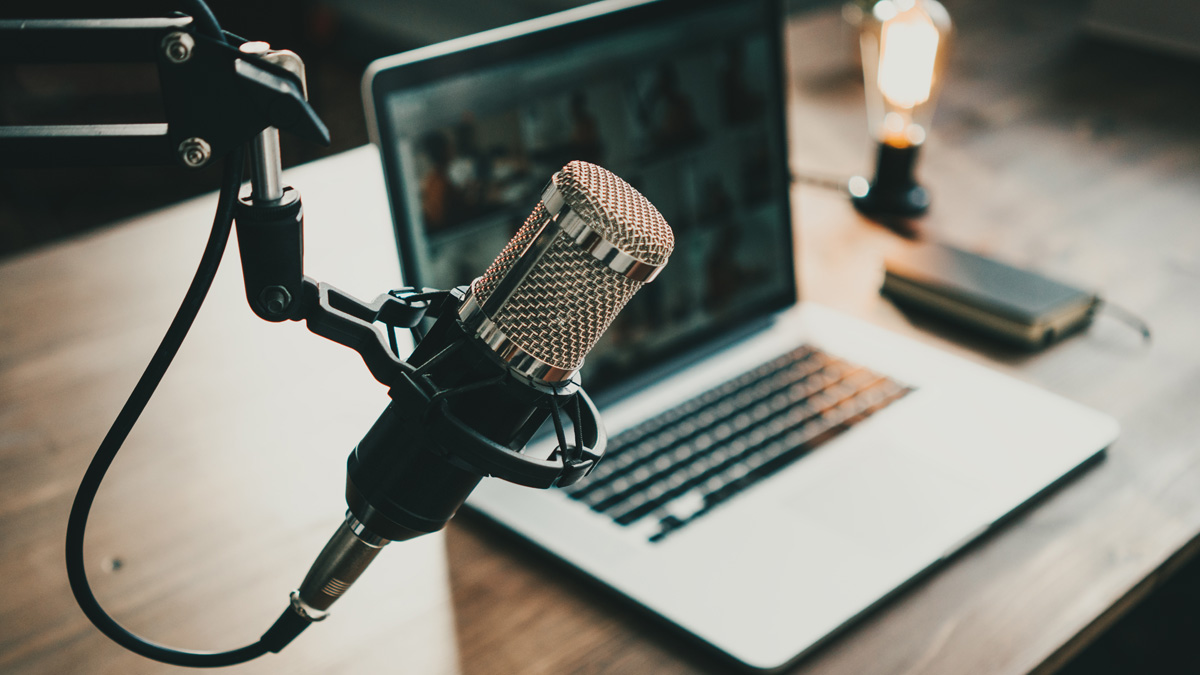 Microphone, laptop and on air lamp on the table