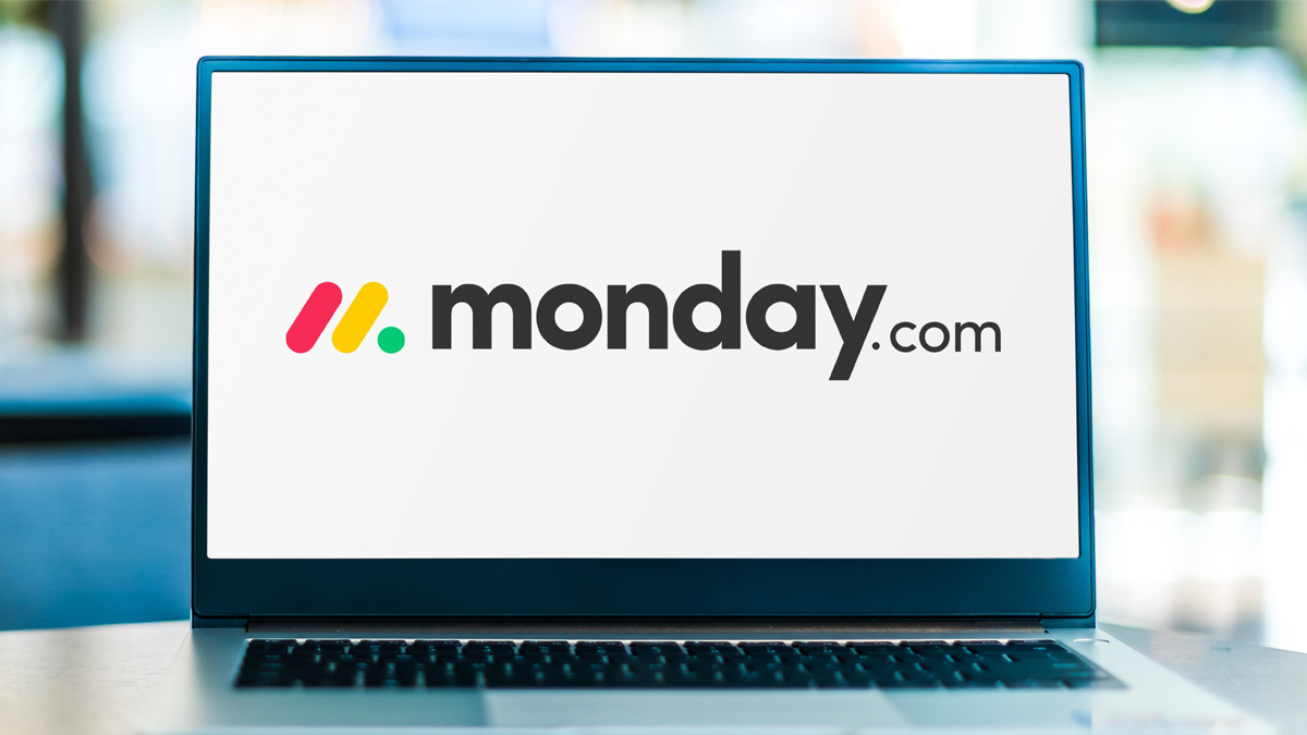 Laptop computer displaying logo of monday.com