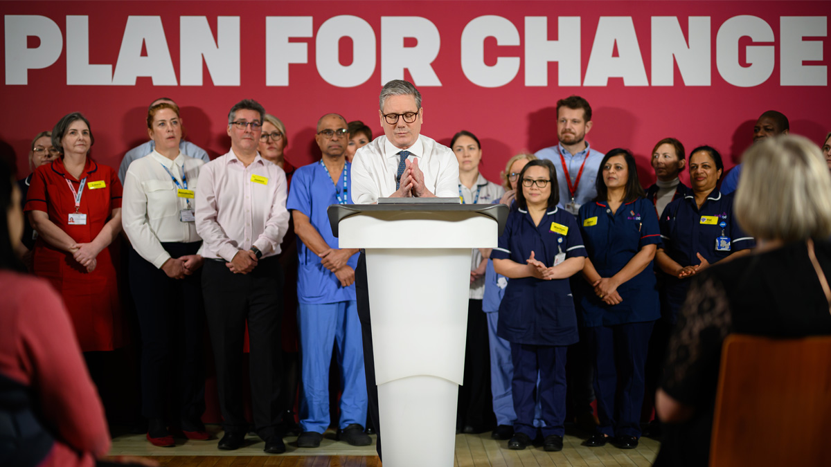 UK Prime Minister Keir Starmer speaks to medical staff and media during a visit to the Elective Orthopaedic Centre at Epsom Hospital